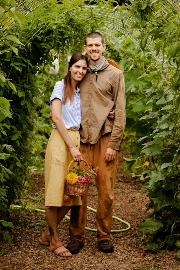 people in garden with flowers