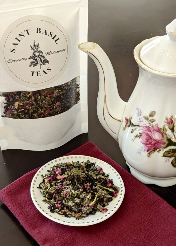 tea bag with tea pot and loose leaf tea in a bowl