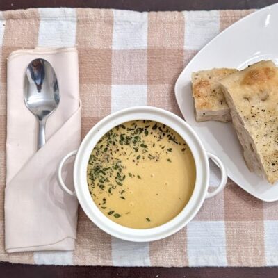 top view of butternut squash soup with bread