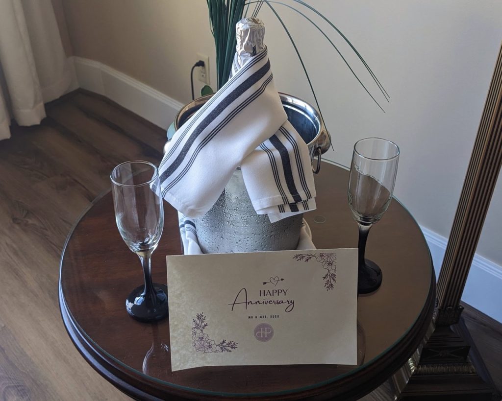 bottle of champagne and two glasses for an anniversary