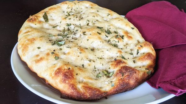 zoomed in loaf of sourdough focaccia bread