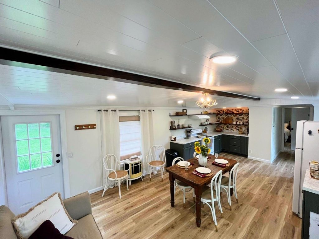 wide angle view of kitchen and dining room